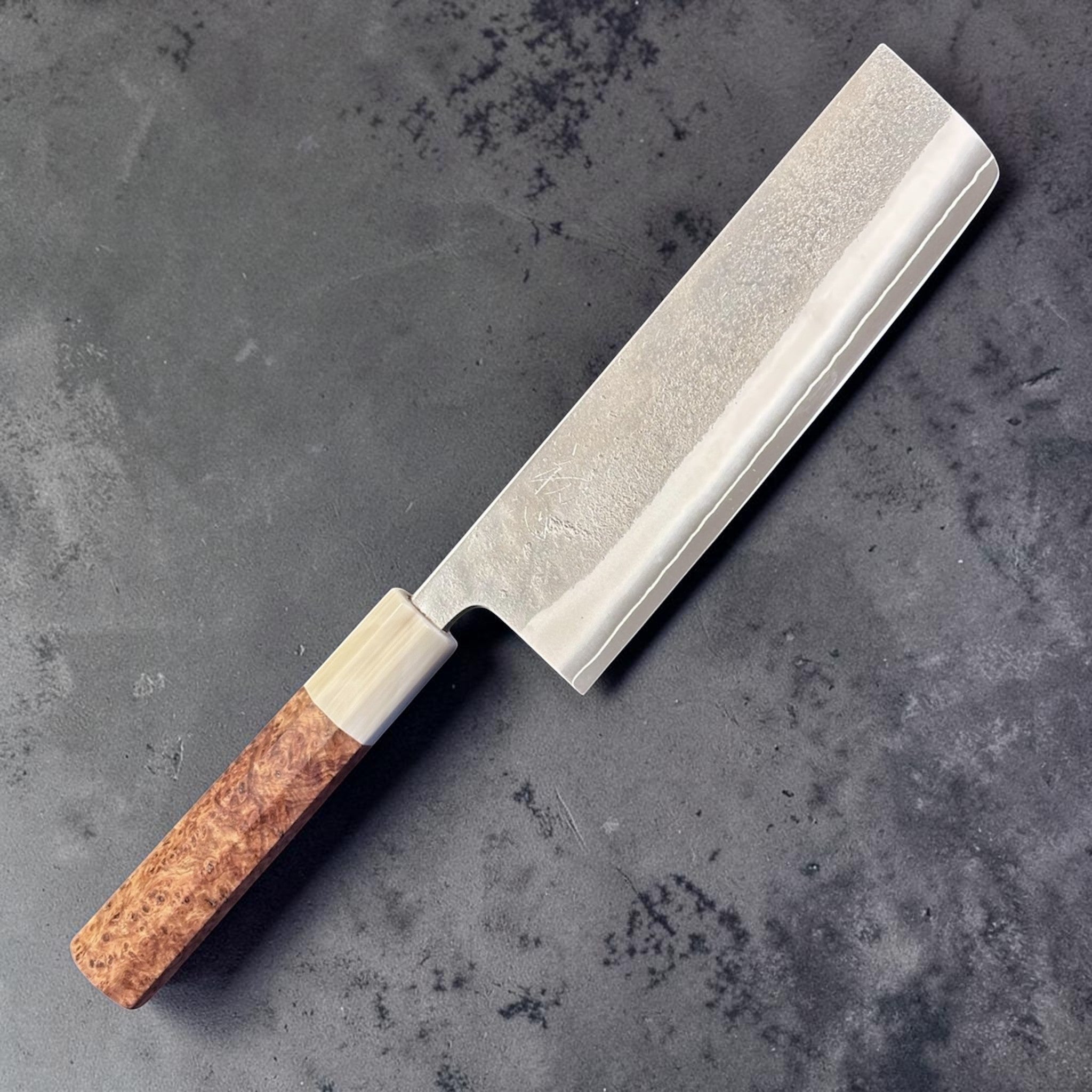 Yoshikane SKD Nashiji Nakiri with amboyna burl handle, angled full-length product view.