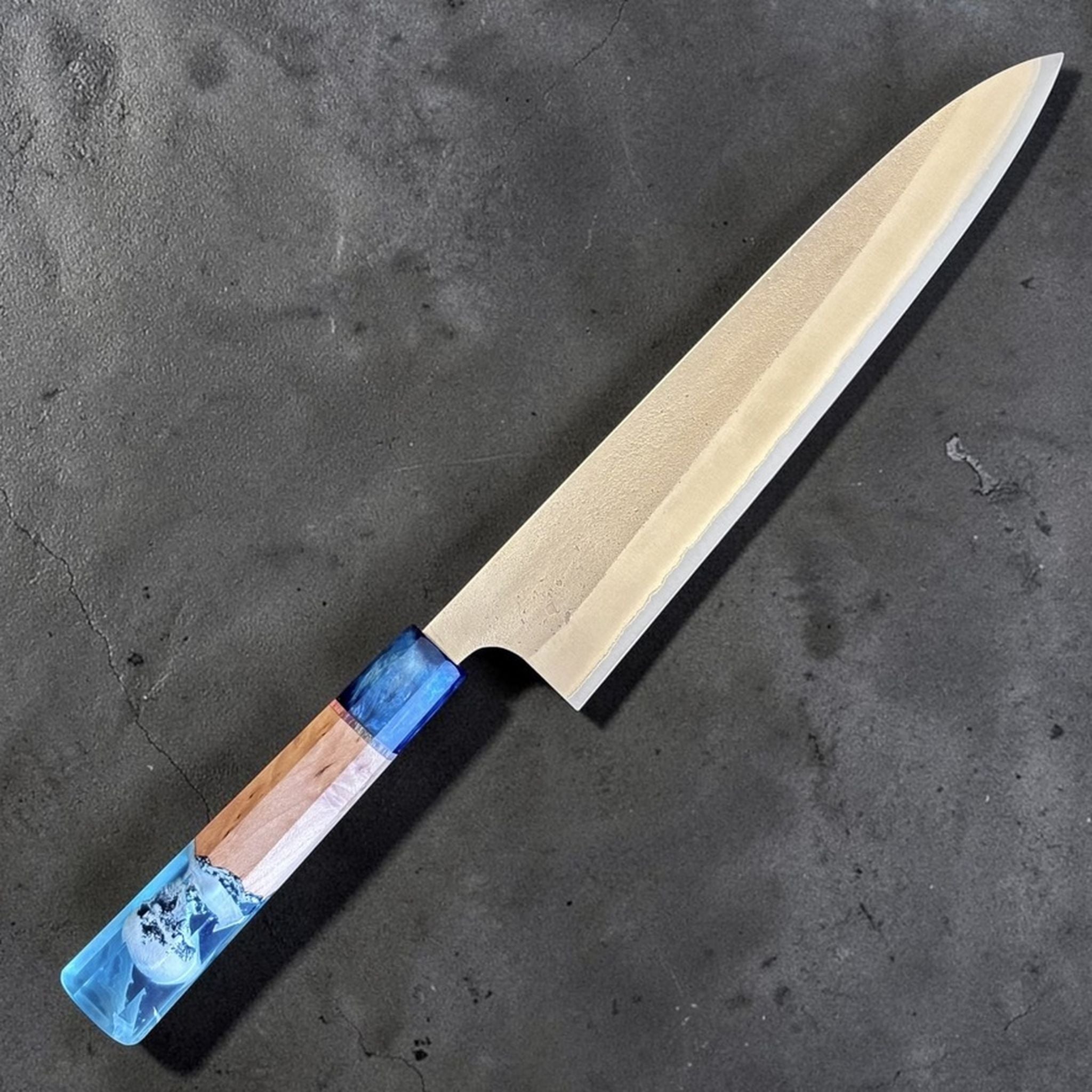 Yoshikane White #2 Nashiji Gyuto 240 mm with Prisma Blue Mountain handle, main diagonal product view showing the full blade and Prisma Blue Mountain handle.