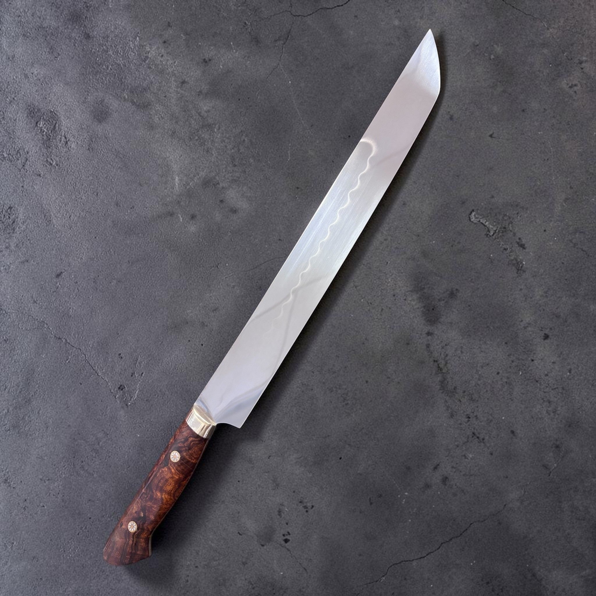 Yoshikazu Ikeda White #2 Honyaki Sakimaru Sujihiki 270 mm, front side with visible hamon and stabilized burl Western handle.