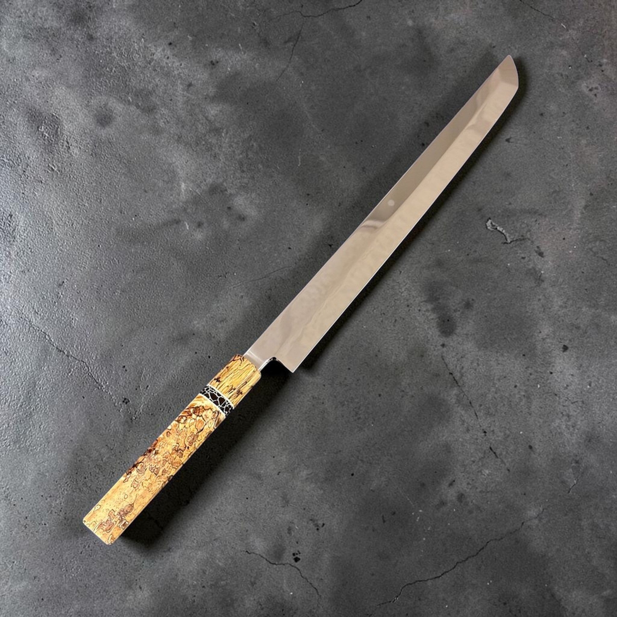 Yoshikazu Ikeda White #2 Honyaki Sakimaru Yanagiba 330 mm Mt Fuji Moon, angled front view highlighting the polished honyaki blade and figured handle.