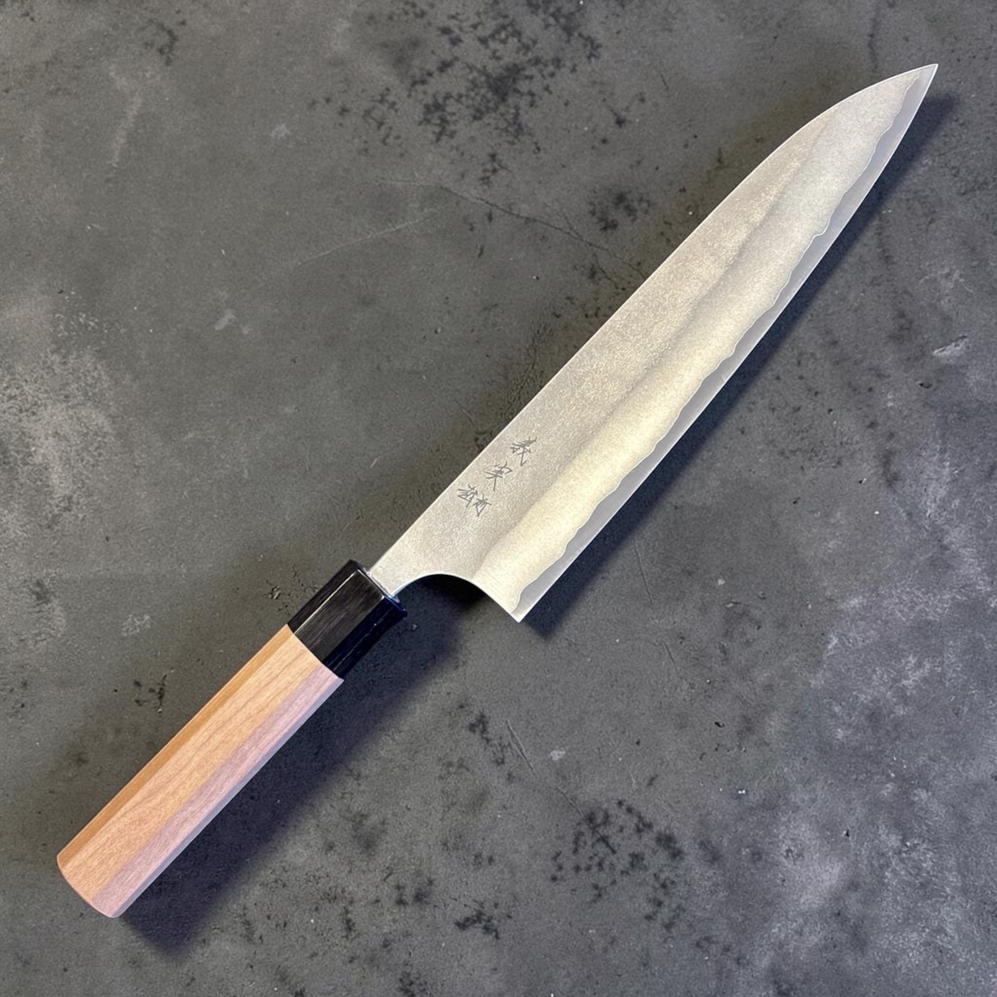 Yoshimi Kato Aogami Super Nashiji Gyuto 210 mm, full profile product photo with natural wood wa handle and black ferrule.