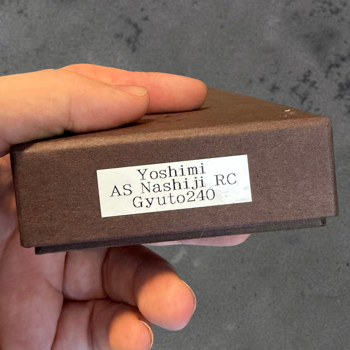 Yoshimi Kato AS Nashiji RC Gyuto 240 box label identifying the knife model.