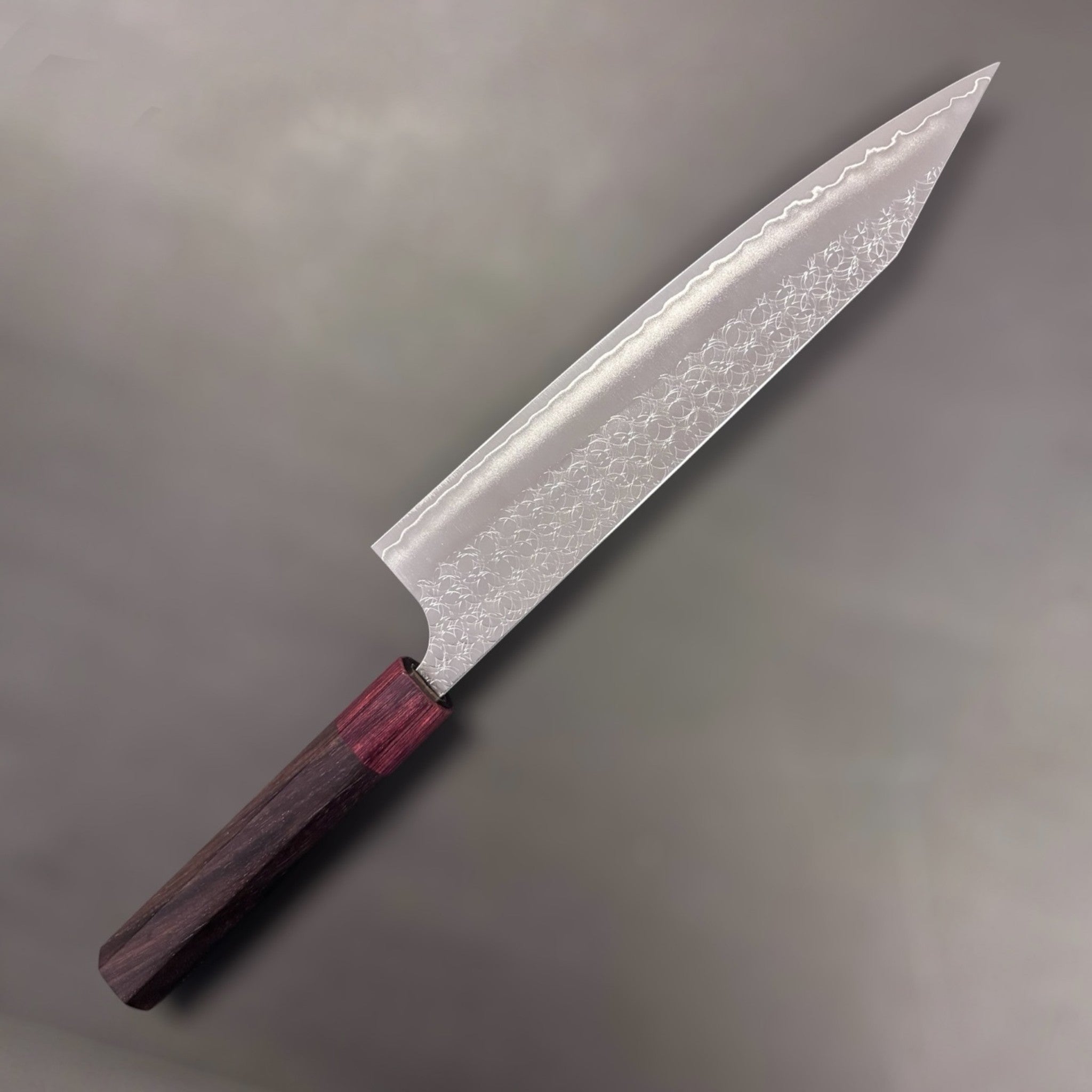 Yoshimi Kato Minamo SG2 Kiritsuke 240 mm, reverse side profile highlighting the Minamo texture and hamon-like cladding line.