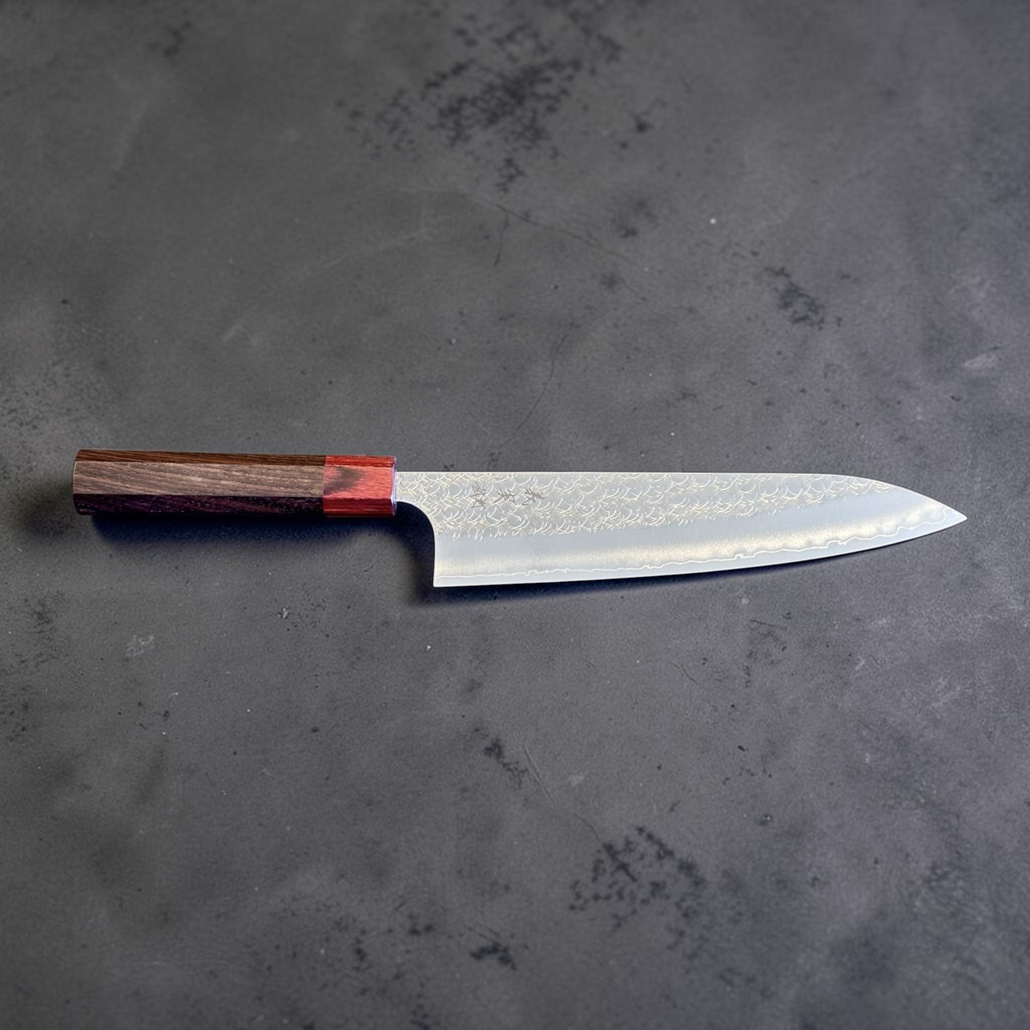 Yoshimi Kato Minamo SG2 Gyuto 210 mm with rosewood and red handle, full side profile of the blade.