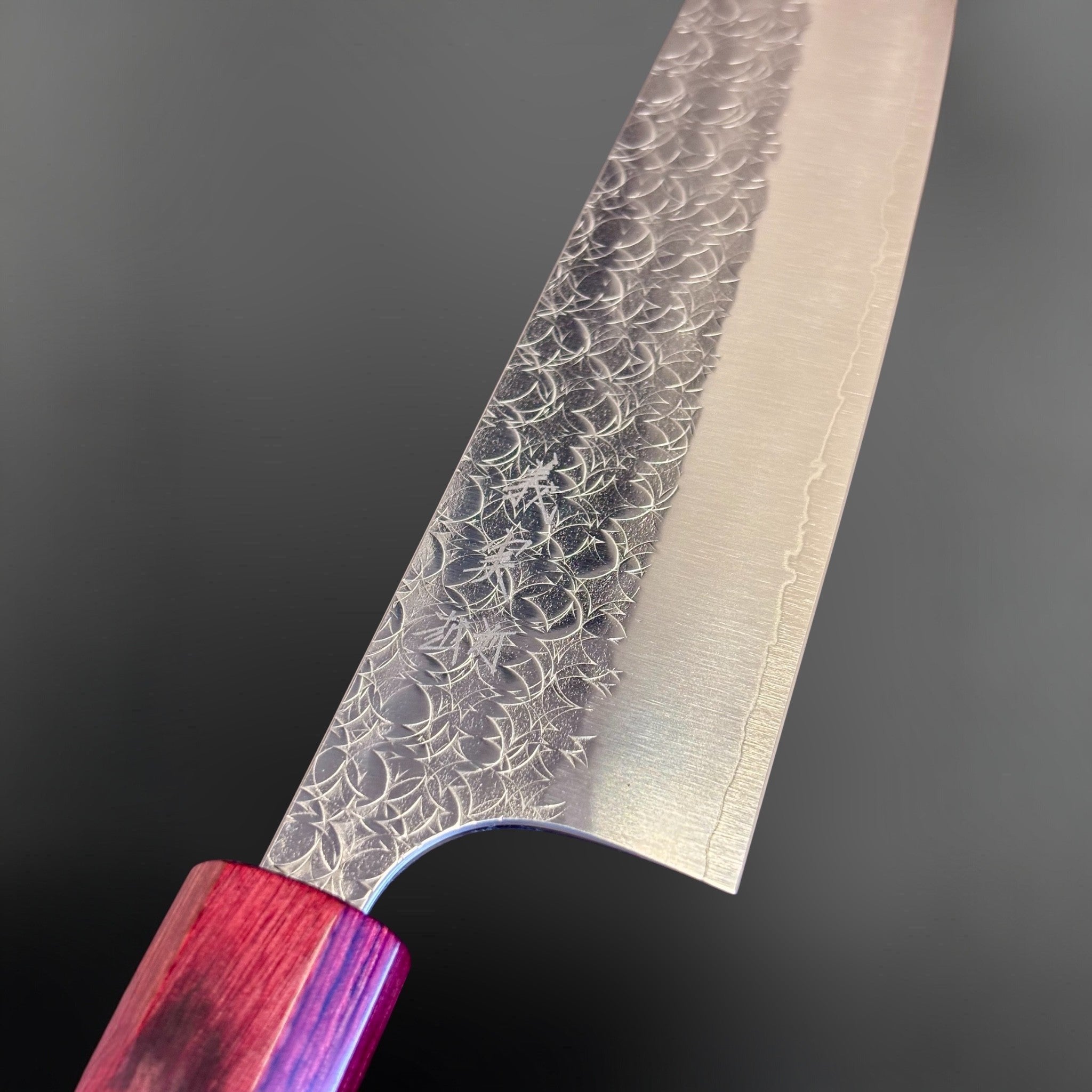 Yoshimi Kato Minamo SG2 Gyuto 210 mm, close-up of the Minamo hammered pattern near the heel.