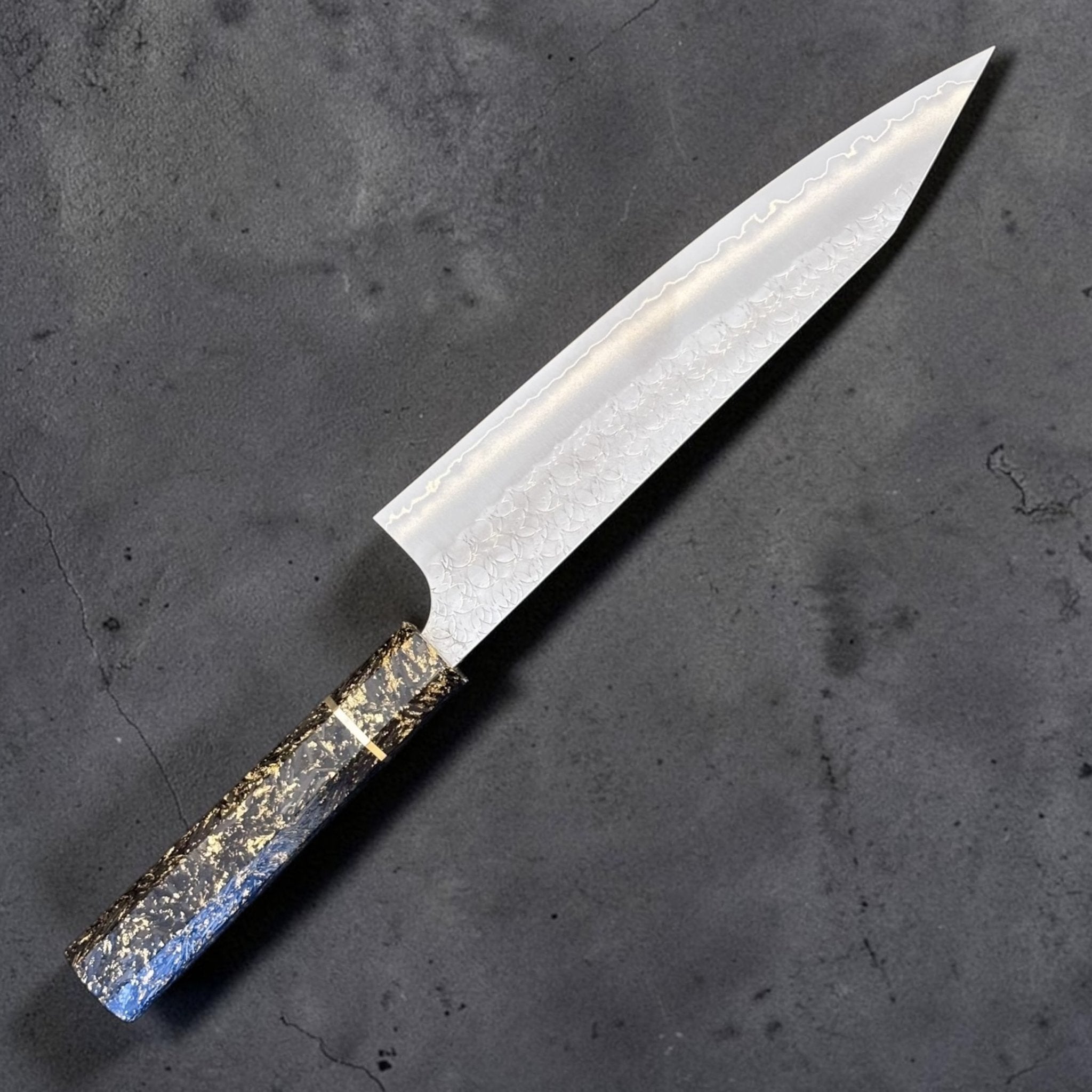 Yoshimi Kato Minamo SG2 Kiritsuke 210 mm with carbon fiber handle, alternate angled view of the blade and handle.