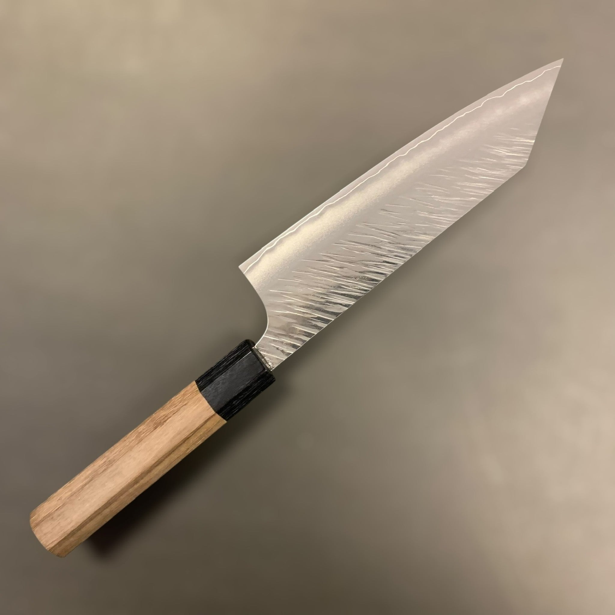 Yu Kurosaki Fujin SG2 Bunka 170 mm, reverse side showing cladding line and hammered texture.