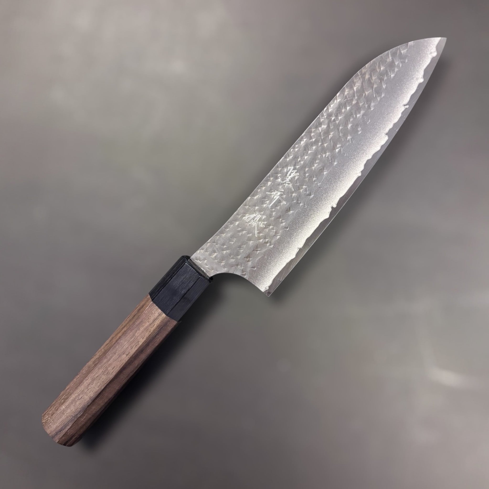 Yu Kurosaki Kokusen AS Santoku 165 mm, spine/tip thinness view on plain background.