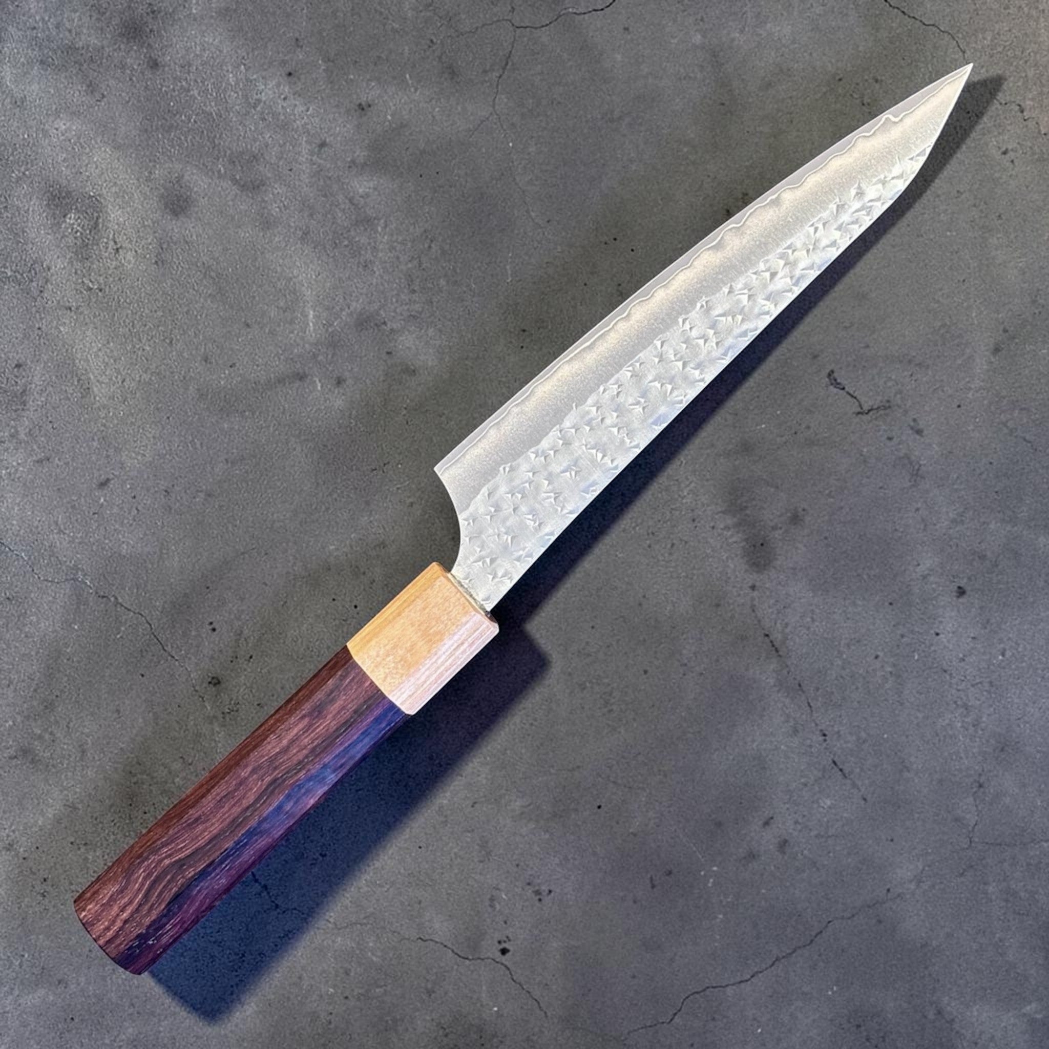 Yu Kurosaki Senko Ei SG2 Petty 150 mm with rosewood octagonal handle, angled full-knife product view showing hammered blade texture.