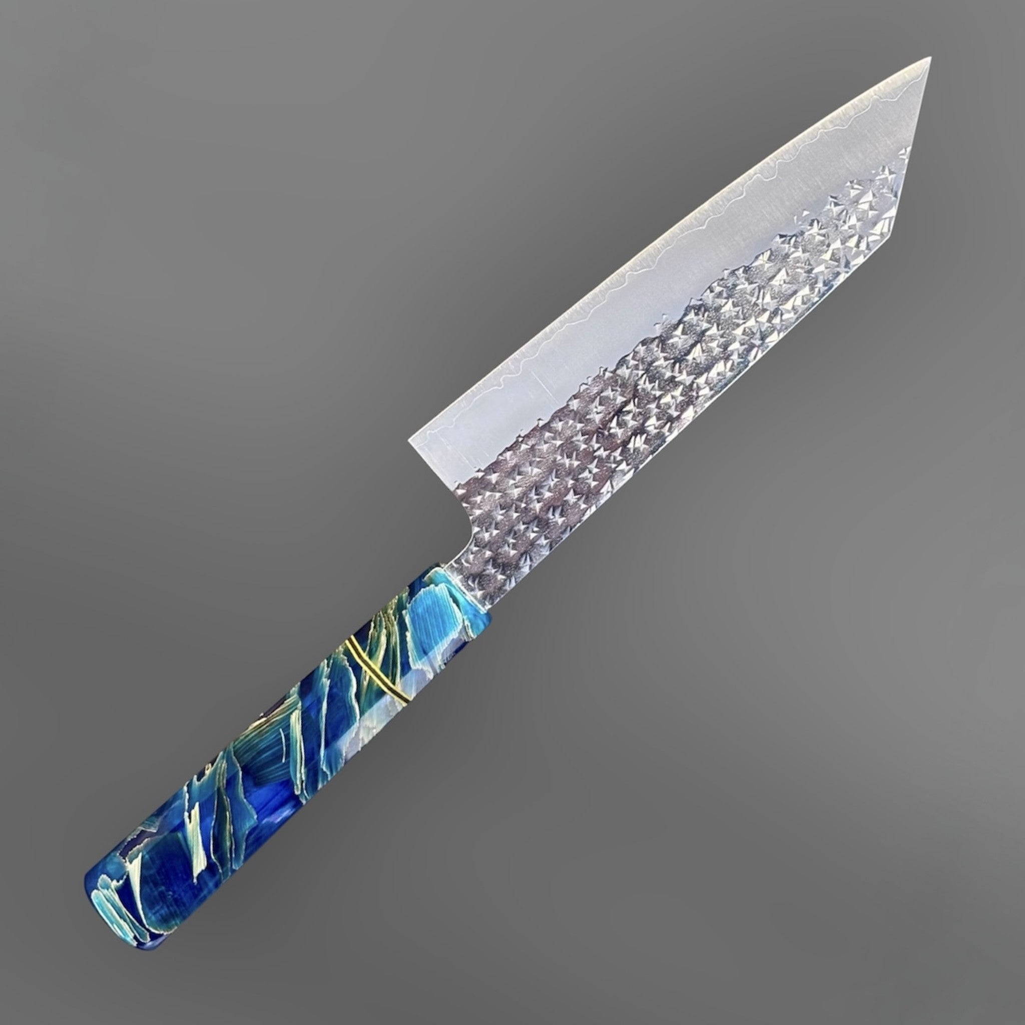 Yu Kurosaki Senko SG2 Bunka with Custom Blue Twistwood Prisma Knife Handle, angled product photo showing the hammered Senko SG2 bunka blade and blue Twistwood Prisma handle.