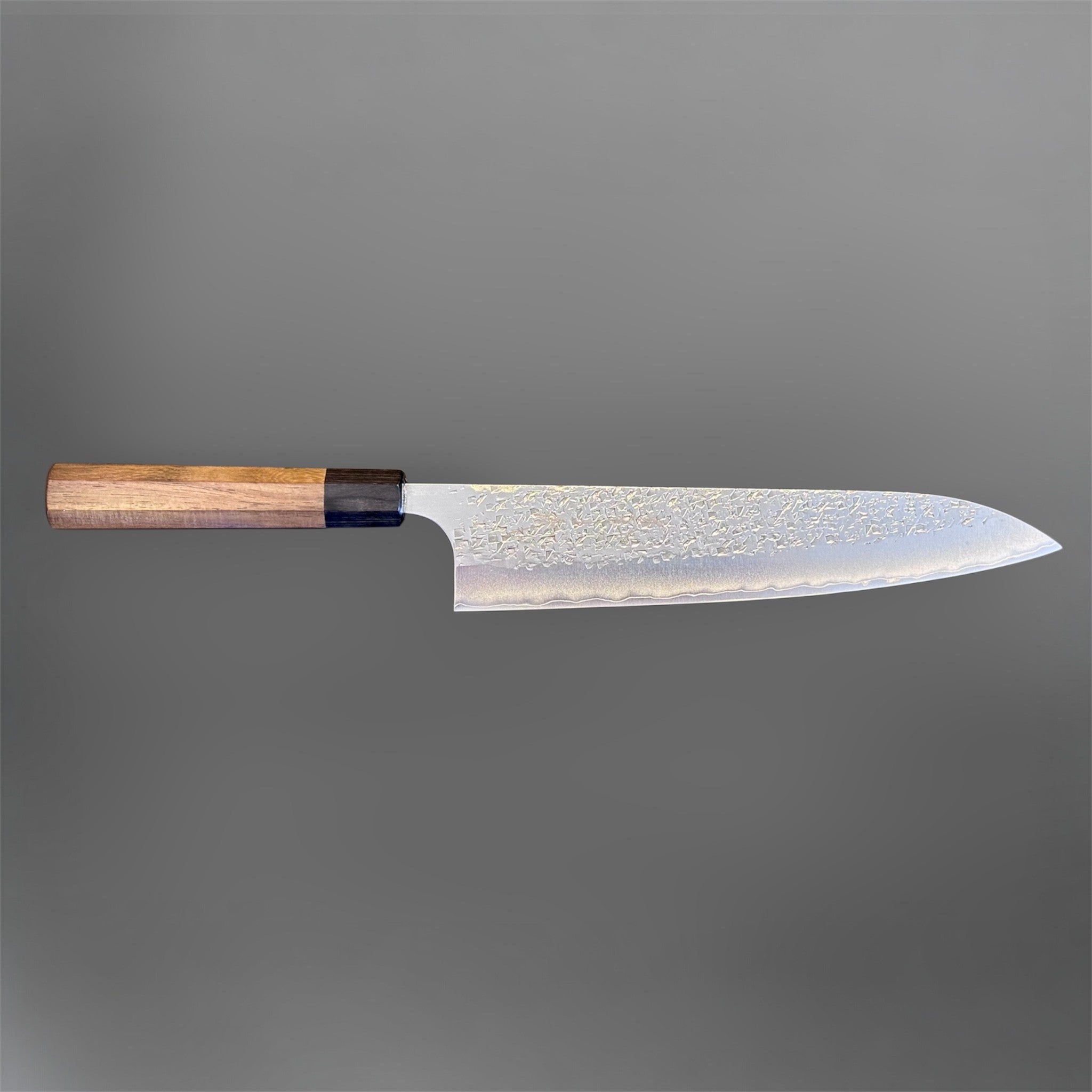 Yu Kurosaki Shizuku SG2 Gyuto 240 mm, side profile view showing the long SG2 blade and octagonal wa handle.