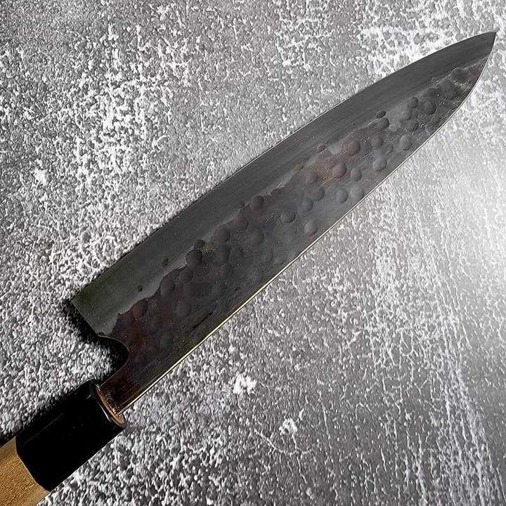 Teruyasu Fujiwara Denka Stainless Clad Kurouchi Tsuchime 240mm Gyuto with Magnolia and Horn Wa Handle Tokushu Knife.